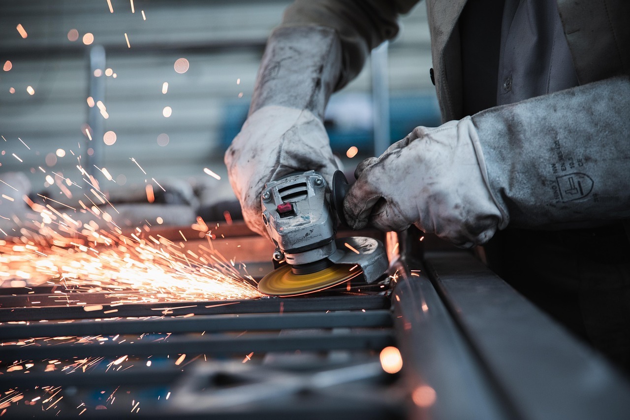 hand grinding metal worker hand grinding metal worker